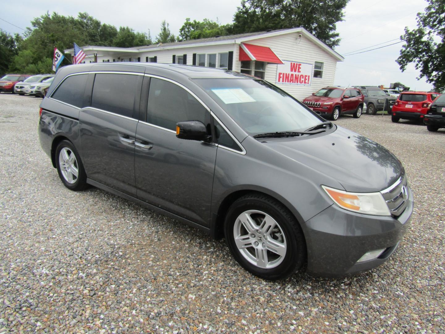 2013 Gray /Gray Honda Odyssey Touring (5FNRL5H97DB) with an 3.5L V6 SOHC 24V engine, Automatic transmission, located at 15016 S Hwy 231, Midland City, AL, 36350, (334) 983-3001, 31.306210, -85.495277 - Photo#0